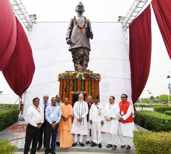 PM visits Varanasi Unveils Lal Bahadur Shastri statue at Varanasi airport Joins a tree plantation drive in Varanasi
