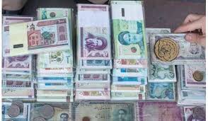 Irans parliament introduces new currency, Toman, to tackle inflation