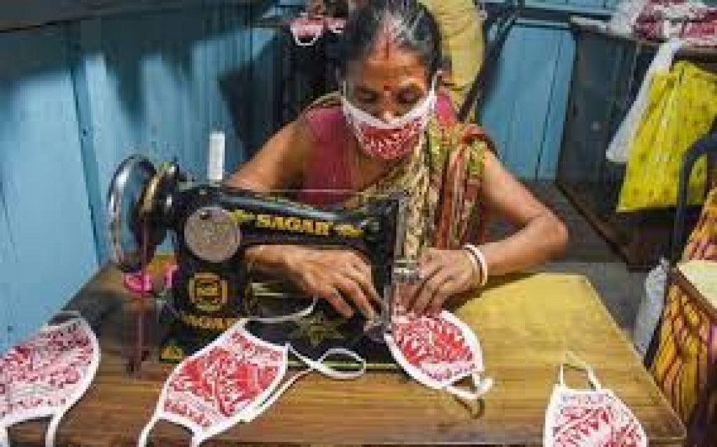 Women prepares homemade masks for villagers to fight COVD 19