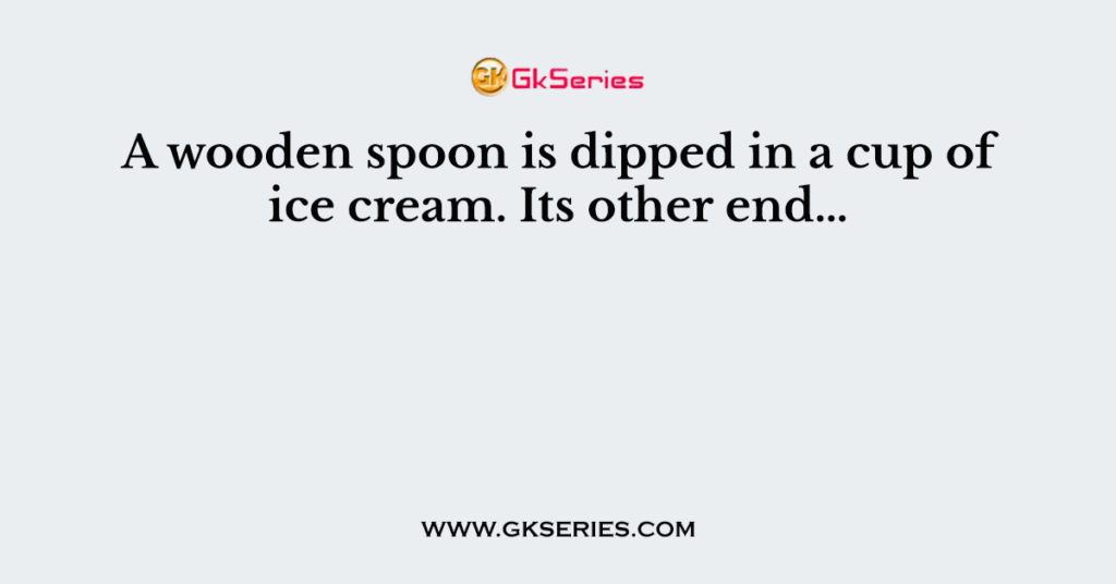 A wooden spoon is dipped in a cup of ice cream. Its other end…